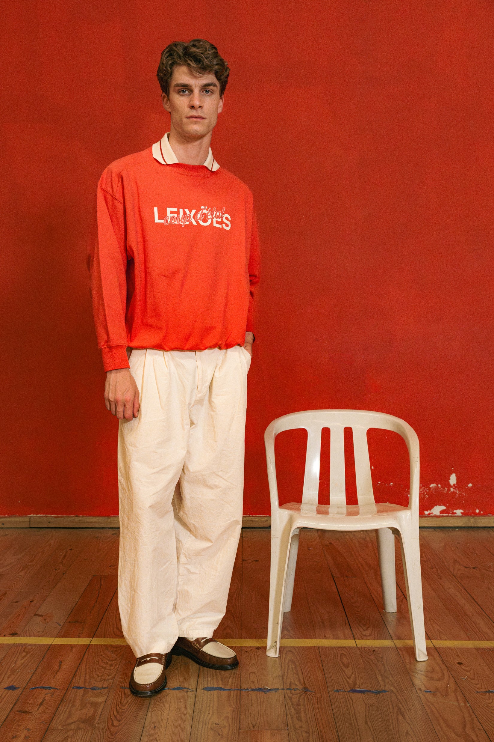 Male model wearing Coup D'État x Leixões collab sweatshirt - Red - Coup D'État Portugal