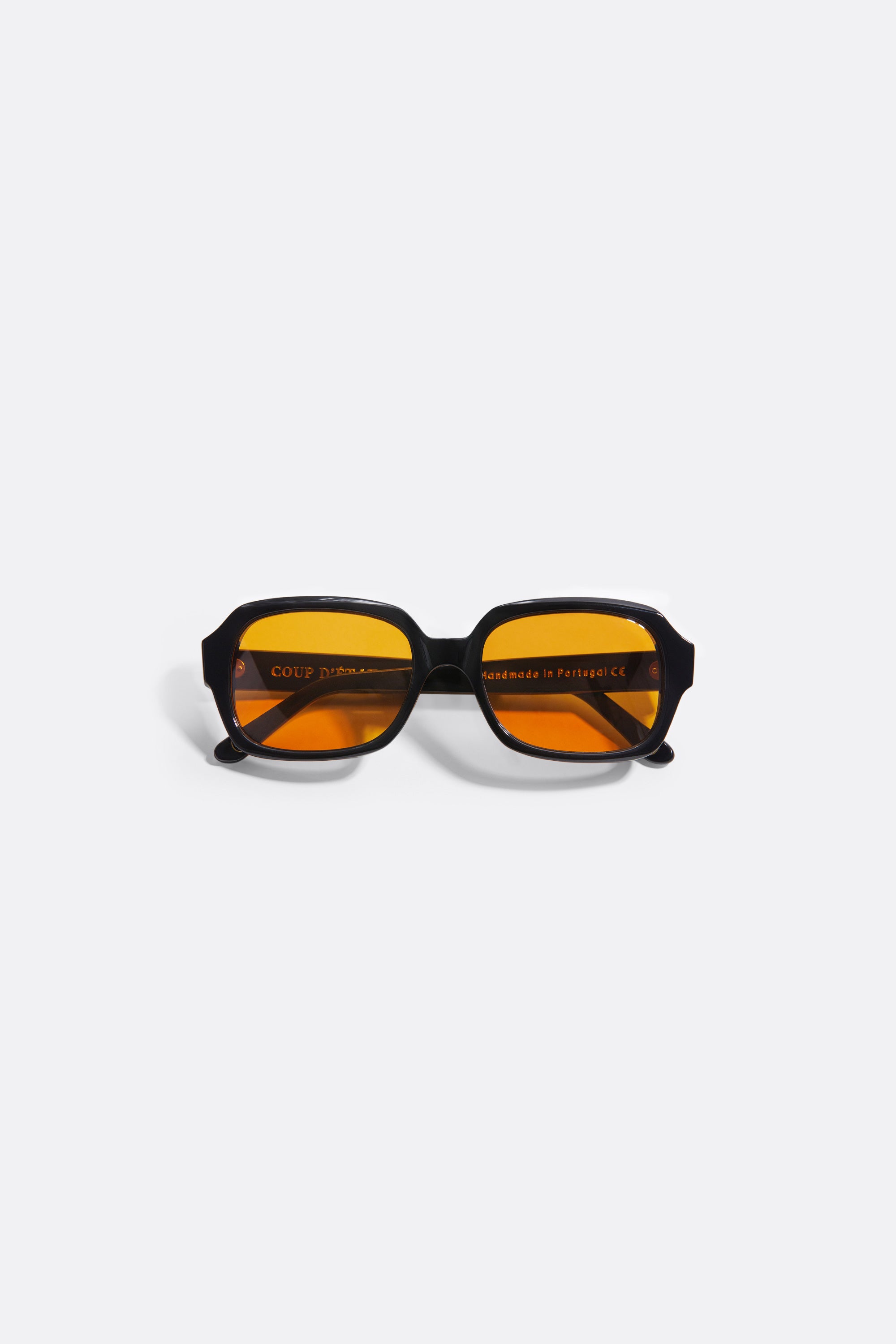 Sunglasses in Black with Orange lenses - Handcrafted - Coup D'État 