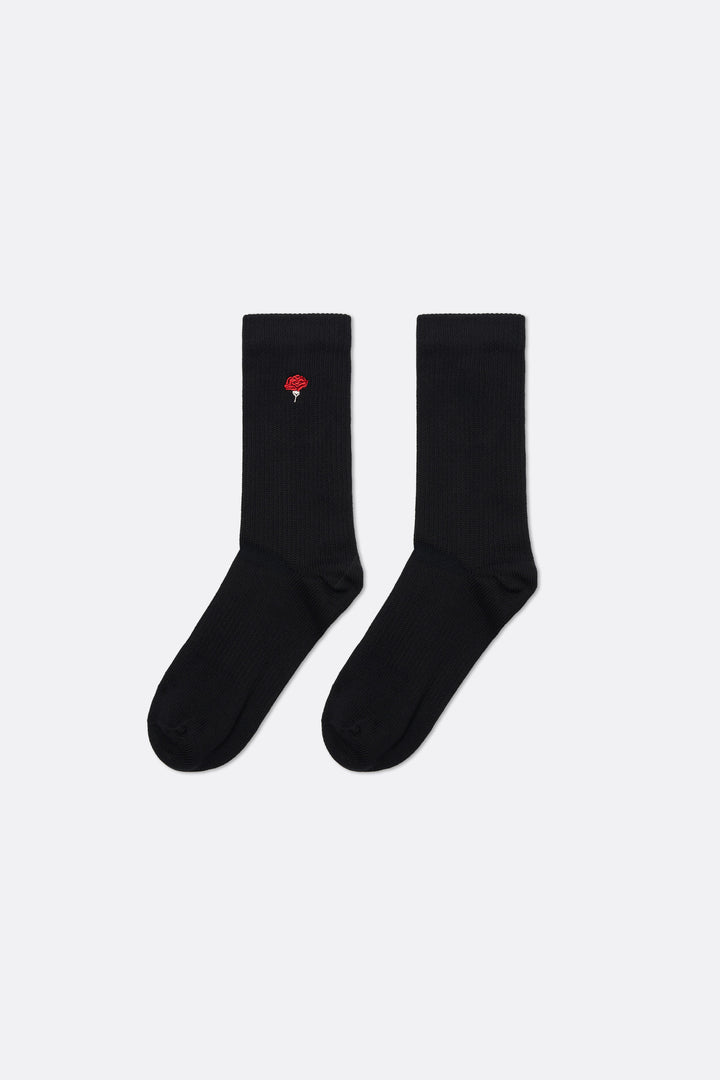 Black sock with a red and white logo  - Coup D'État Portugal